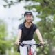 Asian men ride bikes to work She is happy and safe.