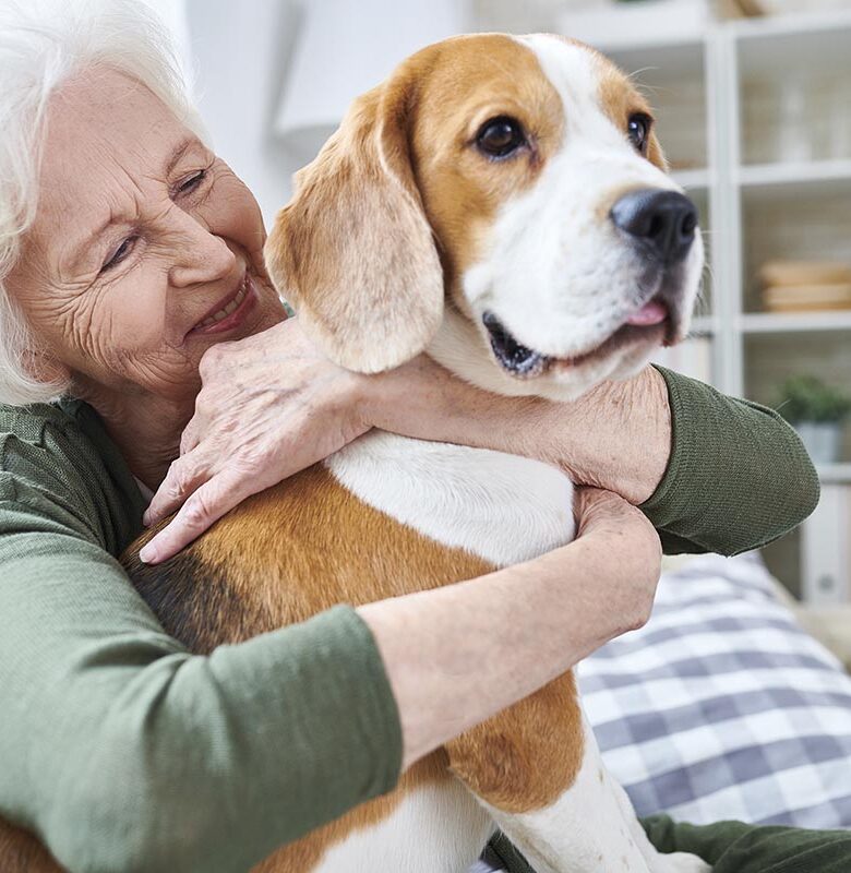 Happy granny loving her dog