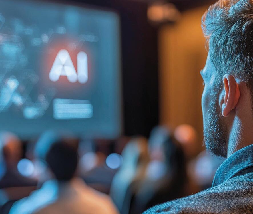 Man Watching AI Presentation in a Conference Room