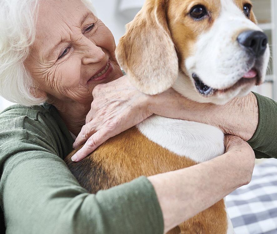 Happy granny loving her dog