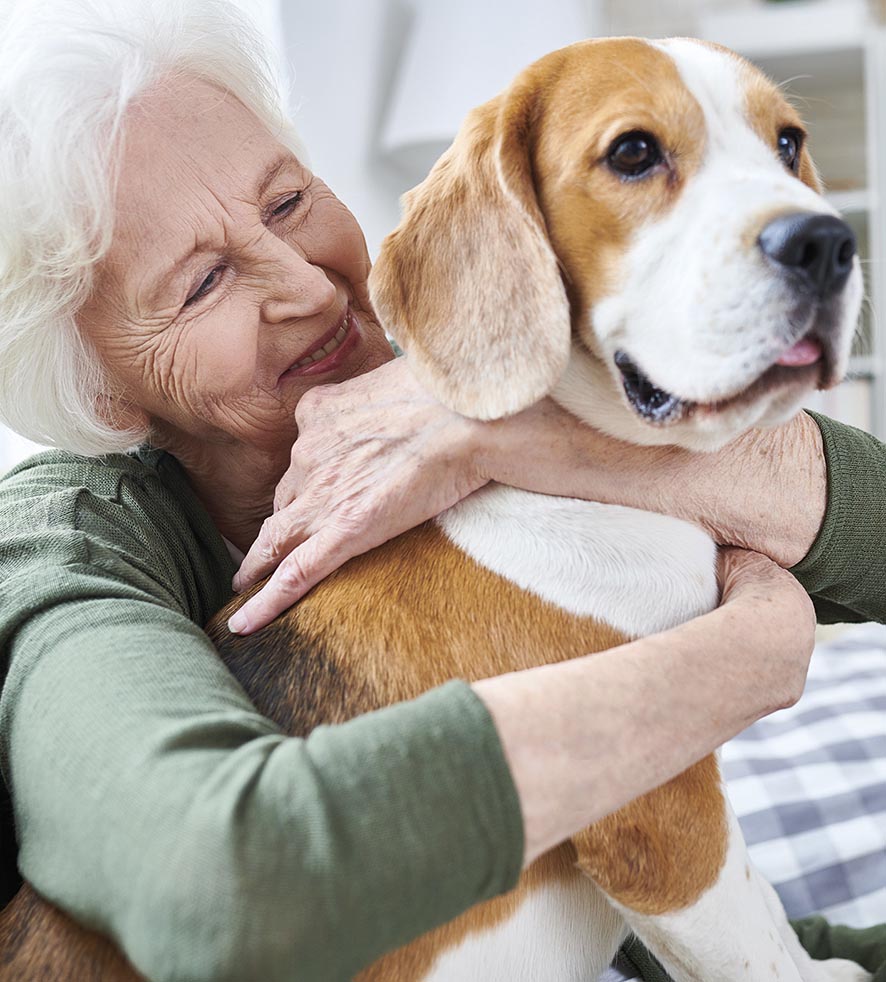 Happy granny loving her dog